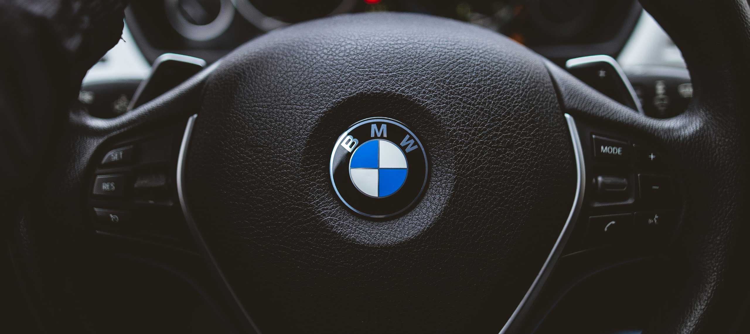 bmw logo on a steering wheel